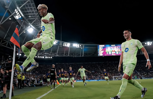 Barcelona players celebrating a late goal